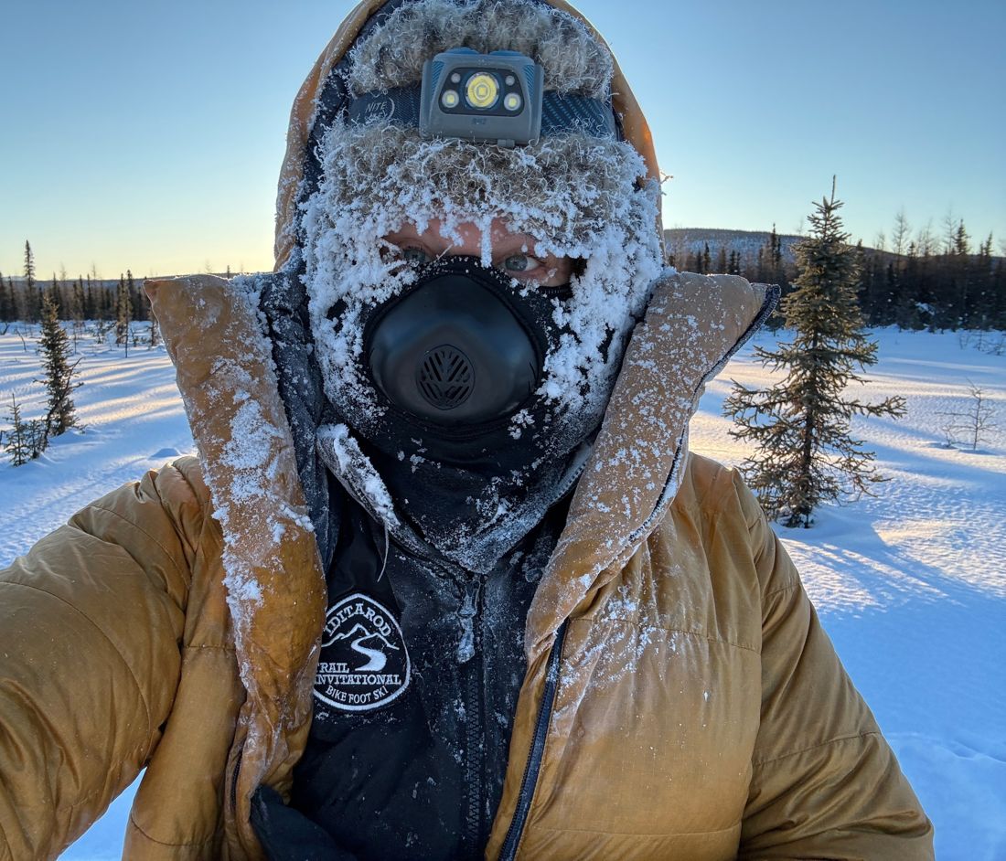 Sunny in a frosted hood and face mask on the Iditarod Trail Invitational